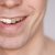 Men smile. Male smiling person. Whitening oral care concept. Teeth before and after. Laughing mounth. Yellow to white color